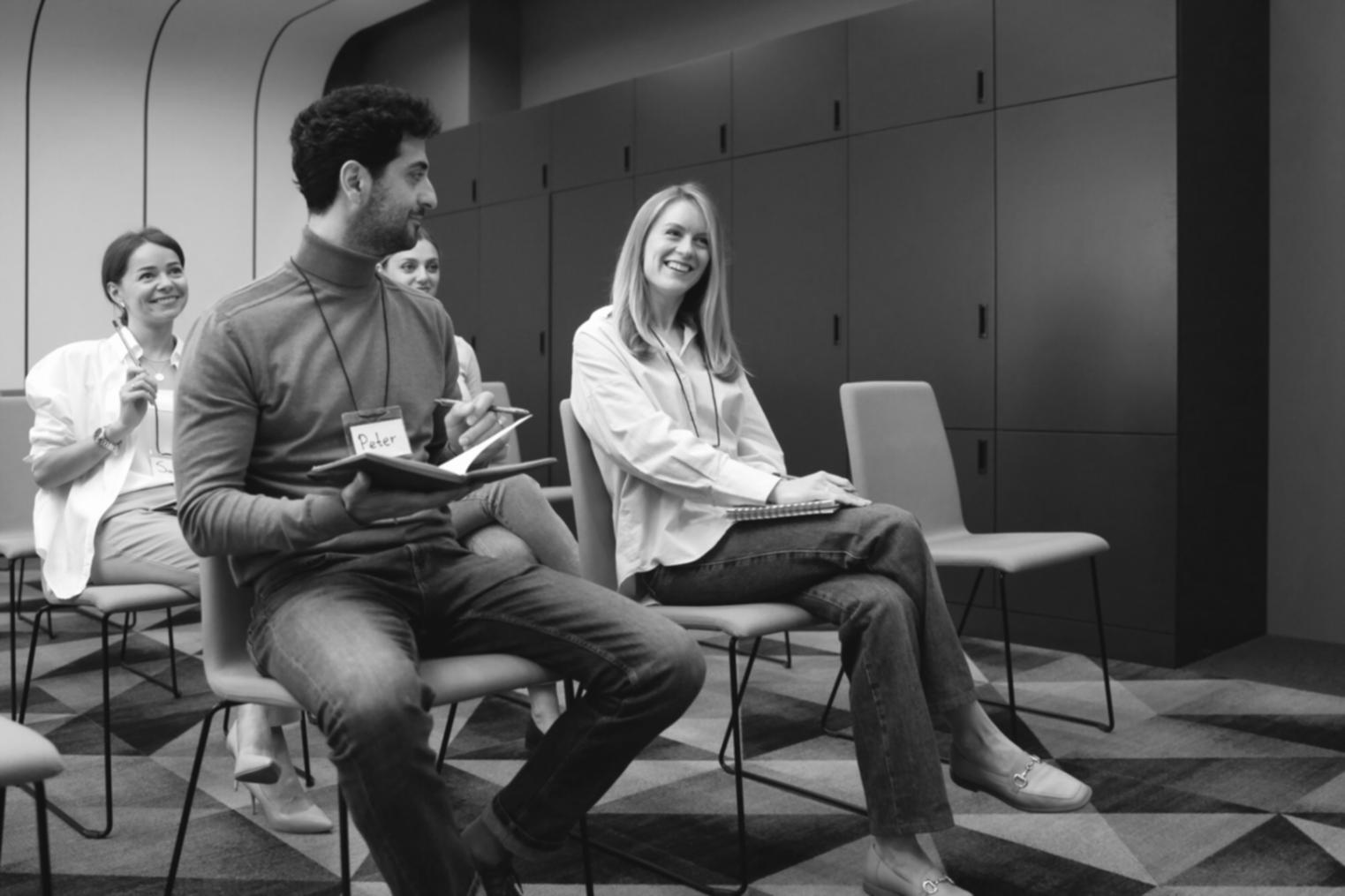 Investment theory classroom discussion with market analysis charts