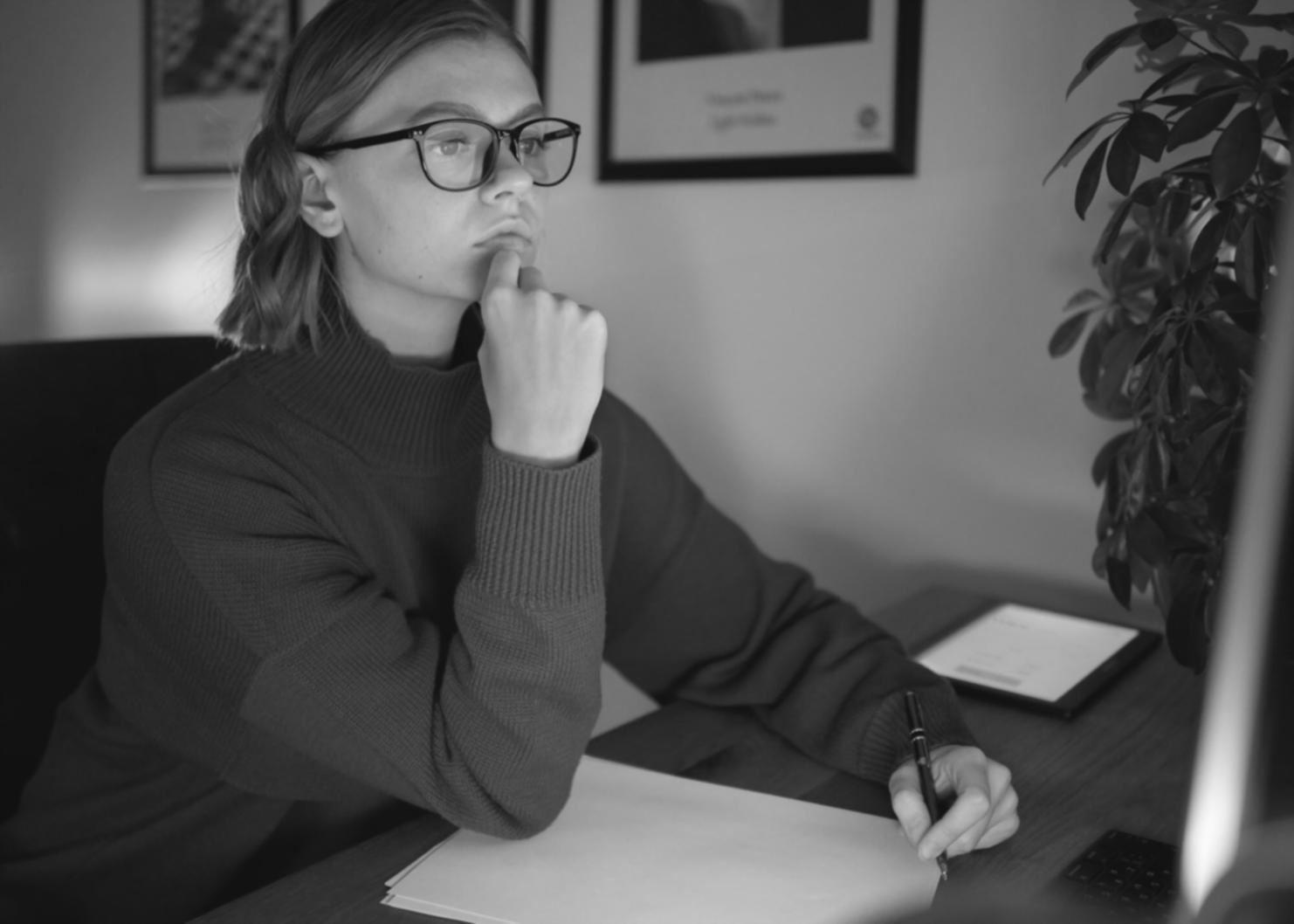 Professional consultation setting showing educational materials and investment planning resources